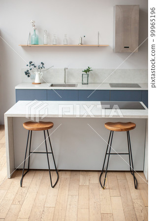 Modern kitchen interior in scandinavian style. Modern kitchen interior in scandinavian style. 99965196