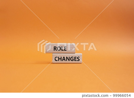 Role changes symbol. Concept words Role changes on wooden blocks. Beautiful orange background. Business and Role changes concept. Copy space. Role changes symbol. Concept words Role changes on wooden blocks. Beautiful orange background. Business and Role changes concept. Copy space. 99966054