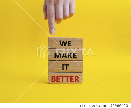 We make it better symbol. Wooden blocks with words We make it better. Beautiful yellow background. Businessman hand. Business and We make it better concept. Copy space. We make it better symbol. Wooden blocks with words We make it better. Beautiful yellow background. Businessman hand. Business and We make it better concept. Copy space. 99966430