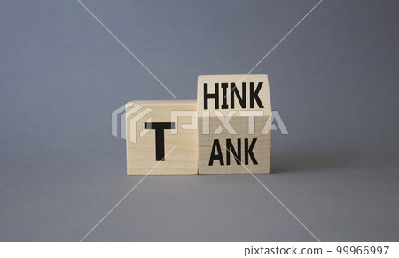 Think Tank symbol. Turned wooden cubes with words Think Tank. Beautiful grey background. Business and Think Tank concept. Copy space Think Tank symbol. Turned wooden cubes with words Think Tank. Beautiful grey background. Business and Think Tank concept. Copy space 99966997