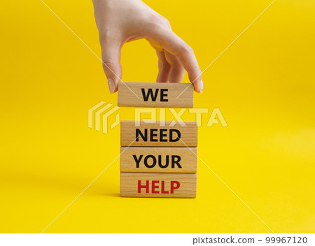 We need your help symbol. Wooden blocks with words We need your help. Beautiful yellow background. Businessman hand. Business and We need your help concept. Copy space. 99967120