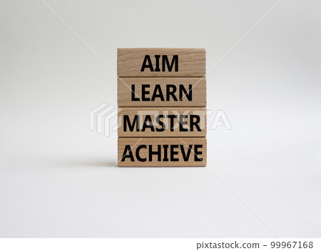 Aim Learn Master Achieve symbol. Concept word Aim Learn Master Achieve on wooden blocks. Beautiful white background. Business and Aim Learn Master Achieve concept. Copy space Aim Learn Master Achieve symbol. Concept word Aim Learn Master Achieve on wooden blocks. Beautiful white background. Business and Aim Learn Master Achieve concept. Copy space 99967168