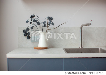 Kitchen worktop, sink close-up. 99968745
