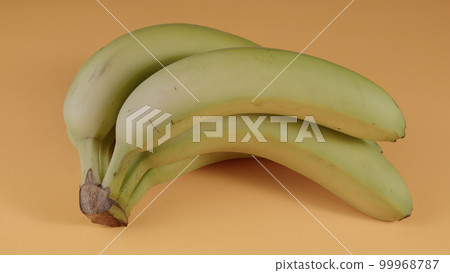 bananas organic fruits healthy diet fresh vegetarian food for breakfast on yellow background 99968787