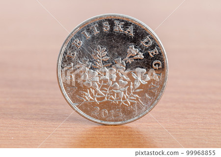 Croatian coin 50 lipa on wooden table. Croatian coin 50 lipa on wooden table. 99968855