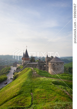 Kamianets-Podilskyi, Ukraine. Colorful balloons flying over a beautiful medieval castle, a very beautiful view of the city. Ballooning for tourists. Kamianets-Podilskyi, Ukraine. Colorful balloons flying over a beautiful medieval castle, a very beautiful view of the city. Ballooning for tourists. 99969467