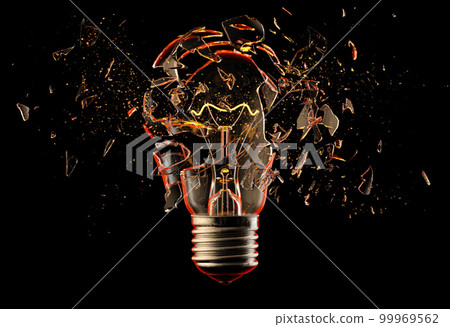 Exploding light bulb on a blue background, Exploding light bulb on a blue background, 99969562