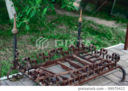 old rusty iron stand for skewers old rusty iron stand for skewers 99970422