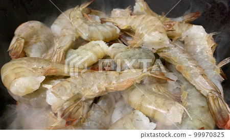 King tiger prawns in shell are fried in a pan 99970825