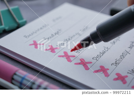 hand drawn red cross on notepad hand drawn red cross on notepad 99972211