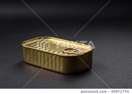 Metal aluminum can of canned sardines in oil with spices and salt 99972754