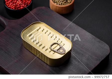 Metal aluminum can of canned sardines in oil with spices and salt 99972757
