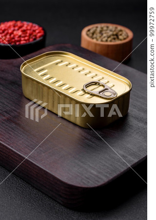 Metal aluminum can of canned sardines in oil with spices and salt 99972759