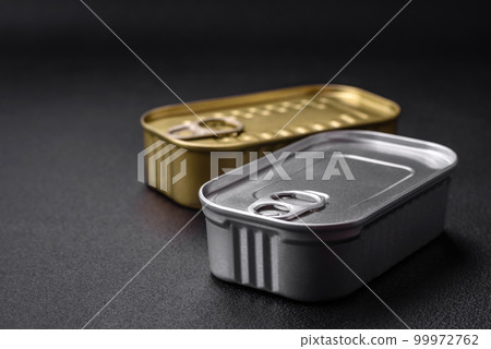 Metal aluminum can of canned sardines in oil with spices and salt 99972762