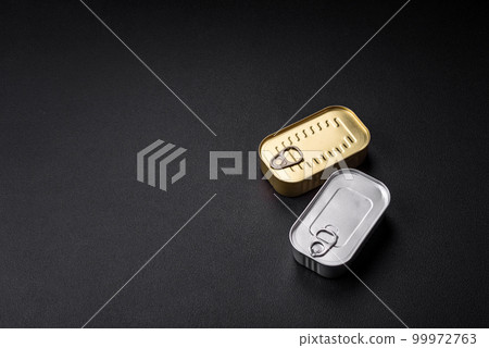 Metal aluminum can of canned sardines in oil with spices and salt 99972763