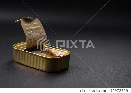 Metal aluminum can of canned sardines in oil with spices and salt 99972769