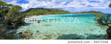 Best beaches of Corsica island - beautiful scenic Tamaricciu with crystal turquoise waters. tropical sea landscape Best beaches of Corsica island - beautiful scenic Tamaricciu with crystal turquoise waters. tropical sea landscape 99972886