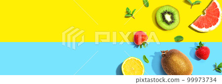 Collection of mixed fruits overhead view 99973734