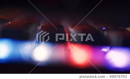 Modern gaming keyboard close-up with beautiful color backlight. Macro shooting of the rgb computer keyboard with backlight. Keyboard keys - macro shot. Low angle view with soft focus. Modern gaming keyboard close-up with beautiful color backlight. Macro shooting of the rgb computer keyboard with backlight. Keyboard keys - macro shot. Low angle view with soft focus. 99978703