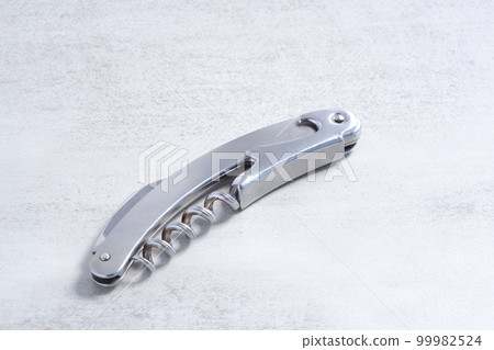 Sommelier knife to open the cork of a bottle of wine Sommelier knife to open the cork of a bottle of wine 99982524