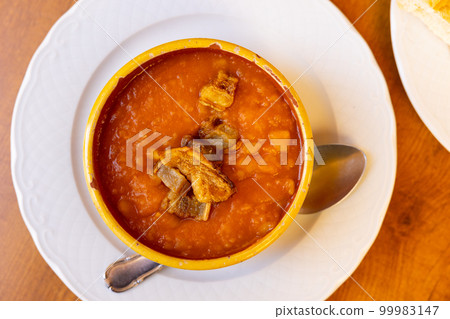 Patatas meneas with fried torreznos, Salamanca cuisine Patatas meneas with fried torreznos, Salamanca cuisine 99983147