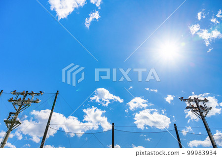 Ground lighting equipment, blue sky, sun 99983934