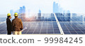 engineer working at solar farm 99984245
