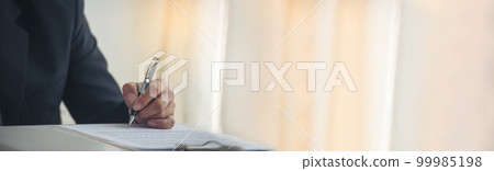 Banner Asian business man using pen signing on new contract start project in conference room. panorama manager businessman hands sign contract on meeting. Business agreement concepts with copy space 99985198