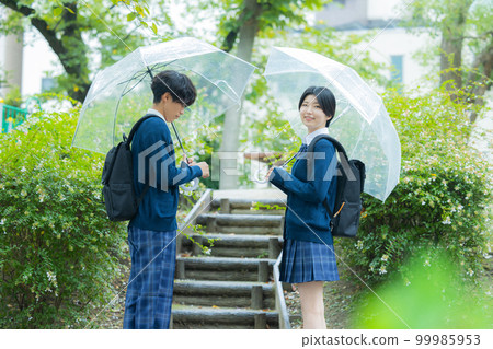 High school student couple rain 99985953