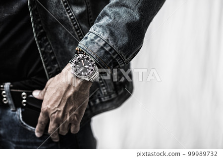 watch on wrist of man 99989732