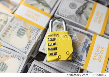 Padlock with combination on background of dollar banknotes. Padlock with combination on background of dollar banknotes. 99990067