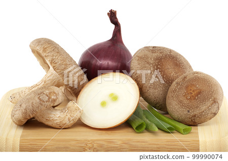 Fresh shiitake mushrooms and onions over white background 99990074