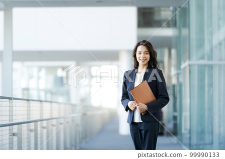 Women's portrait in suit Women's portrait in suit 99990133