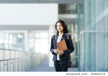 Women's portrait in suit Women's portrait in suit 99990134