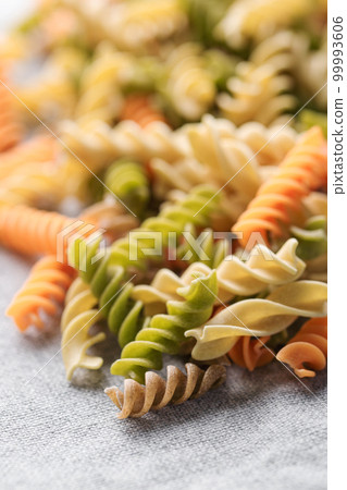 A variety of fusilli pasta made from different types of legumes, green and red lentils, mung beans and chickpeas. Gluten-free pasta. 99993606