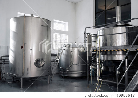 interior of modern factory brewery with tanks inside 99993618