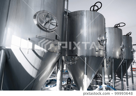 beer production plant. interior of modern technological brewery beer production plant. interior of modern technological brewery 99993648