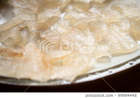 Natural flounder wrapped in kombu seaweed Natural flounder wrapped in kombu seaweed 99994448