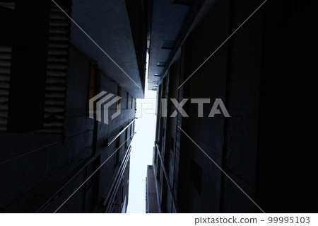 Photo of a gap in a building Photo of a gap in a building 99995103