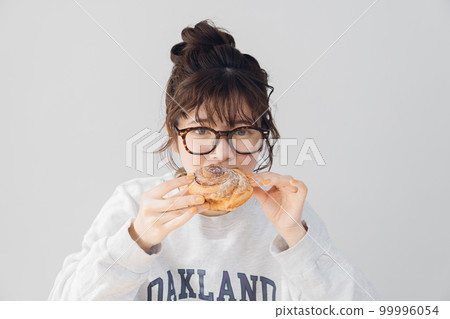 woman relaxing indoors 99996054