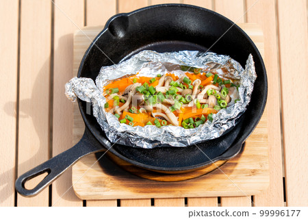 Camping rice with foil grilled salmon made in a skillet 99996177