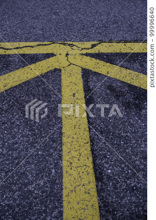 Yellow line on the asphalt Yellow line on the asphalt 99996640