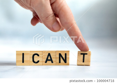 Change the word I can't to read I can concept for self belief, positive attitude and motivation, Hand removing the can't text wooden cubes background texture Change the word I can't to read I can concept for self belief, positive attitude and motivation, Hand removing the can't text wooden cubes background texture 100004718