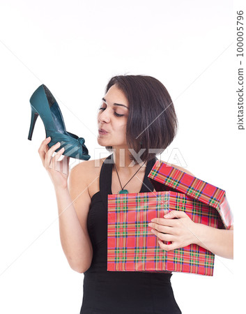Pretty girl with a pair of shoes 100005796