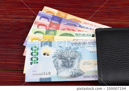 Philippine peso in the black wallet Philippine peso in the black wallet 100007194