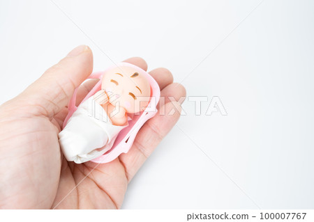 Image of gently wrapping a baby Image of gently wrapping a baby 100007767