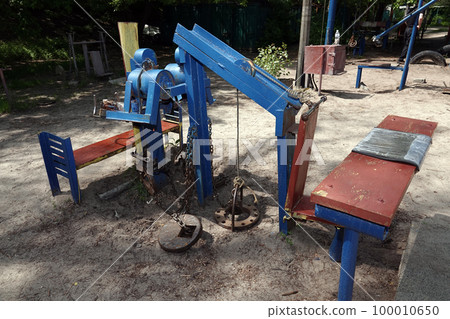 Kiev, Ukraine May 15, 2020: home-made simulators on which Kiev residents go in for sports in the hydropark Kiev, Ukraine May 15, 2020: home-made simulators on which Kiev residents go in for sports in the hydropark 100010650
