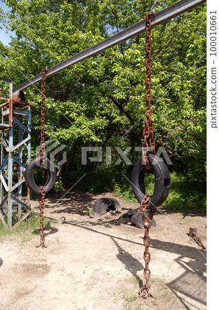 Kiev, Ukraine May 15, 2020: home-made simulators on which Kiev residents go in for sports in the hydropark Kiev, Ukraine May 15, 2020: home-made simulators on which Kiev residents go in for sports in the hydropark 100010661