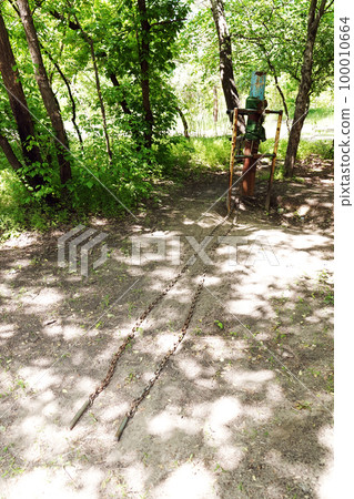 Kiev, Ukraine May 15, 2020: home-made simulators on which Kiev residents go in for sports in the hydropark Kiev, Ukraine May 15, 2020: home-made simulators on which Kiev residents go in for sports in the hydropark 100010664