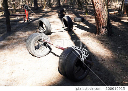 Kiev, Ukraine May 15, 2020: home-made simulators on which Kiev residents go in for sports in the hydropark Kiev, Ukraine May 15, 2020: home-made simulators on which Kiev residents go in for sports in the hydropark 100010915